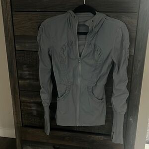 Reversible Lululemon jacket full zip with hood.